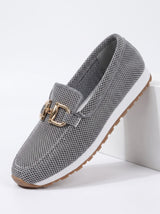 Side view of silver gray slip-on loafer