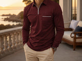 Burgundy Ronan polo on a coastal terrace