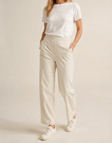 Ivory Aria barrel-leg pants on a model