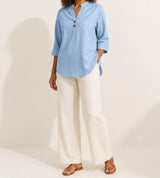 Light Blue Elara stretch slub linen-blend tunic blouse on an American model