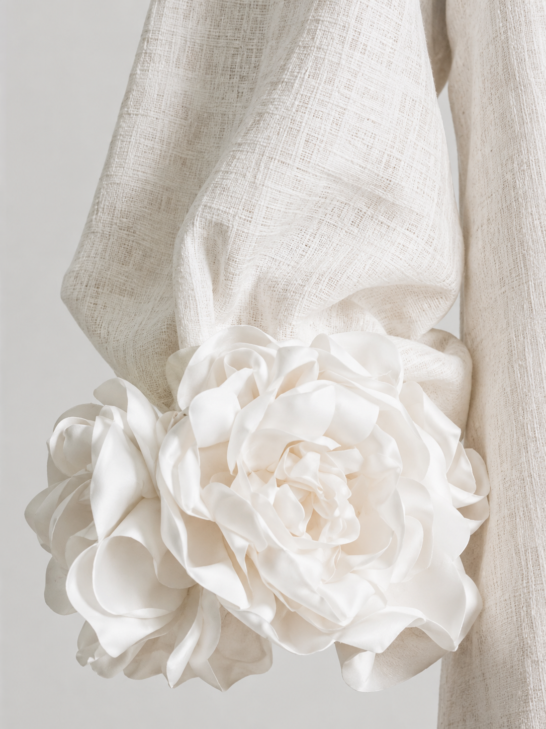 Aurelia lantern sleeve and dimensional flower cuff detail