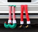 Santa and elf legs trunk decorations — installed view