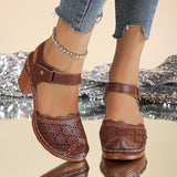 Brown perforated closed-toe ankle-strap block heel sandals