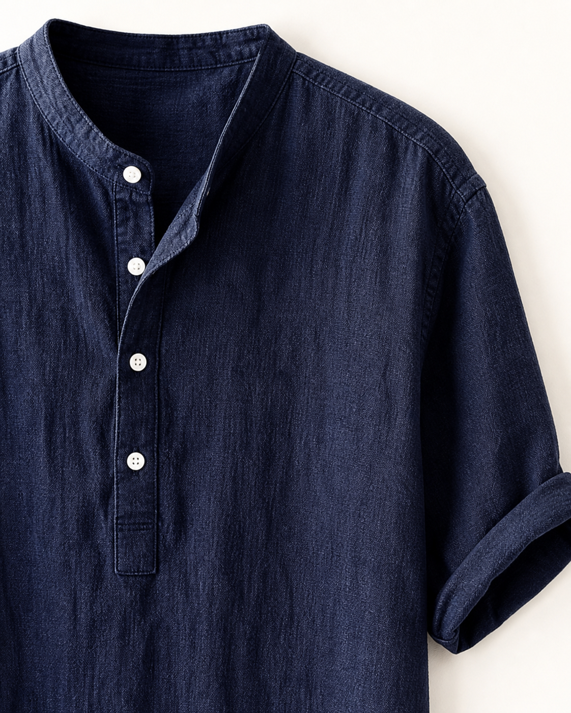Hayes band collar, four-button placket and cuff details